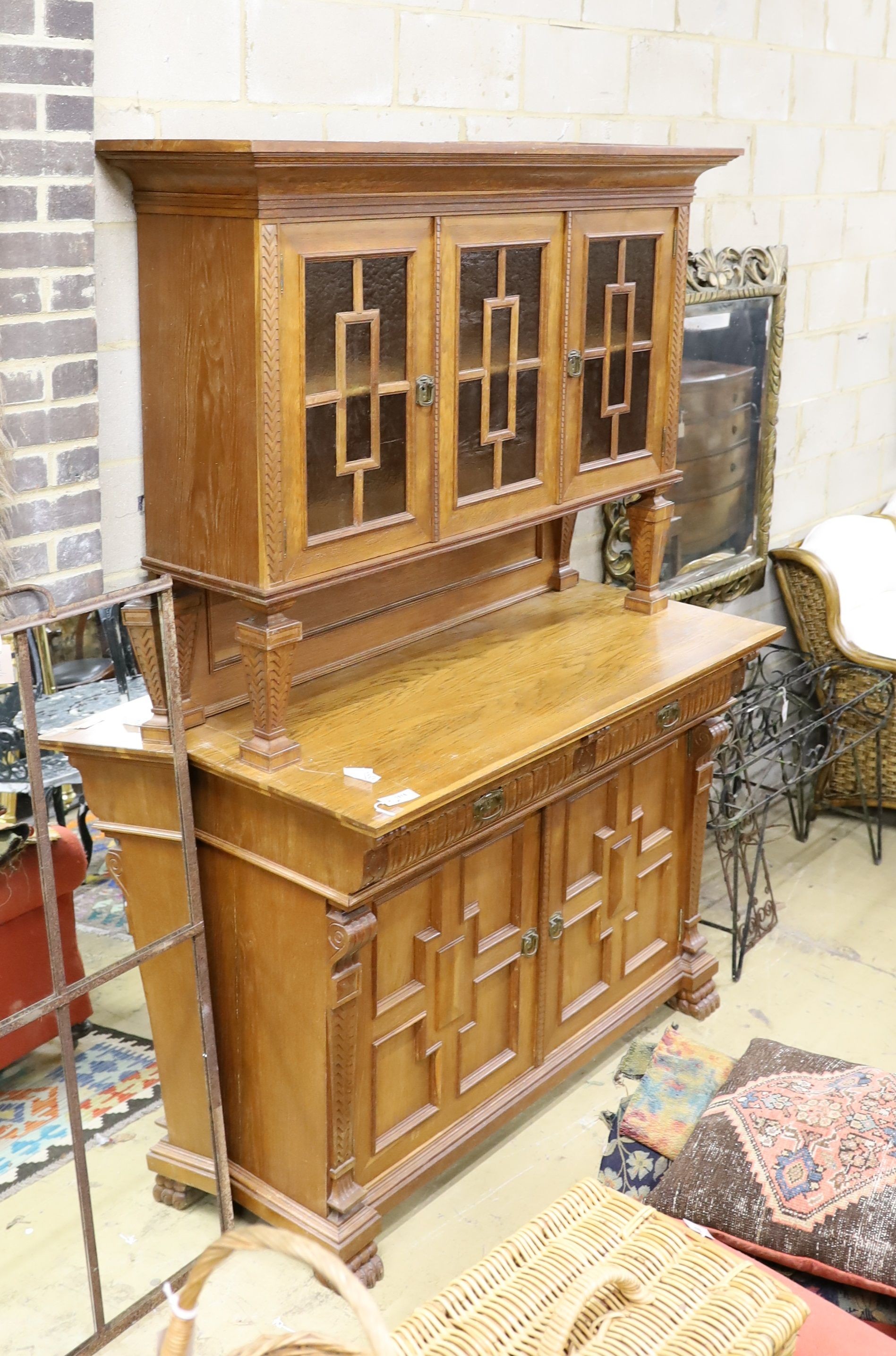 An early 20th century Continental oak buffet, length 148cm, depth 65cm, height 220cm